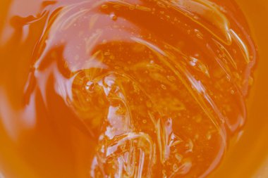 Epilasyon için profesyonel şeker macunu. Spa salonunda Shugaring prosedürü. Spatula. Evde balmumuyla birlikte tüy dökülüyor. Alan arkaplan afişini kopyala. Tatlı bal kompozisyonu. Yakın plan.