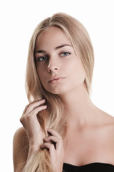 Blonde Schönheit auf Weiß — Stockfoto