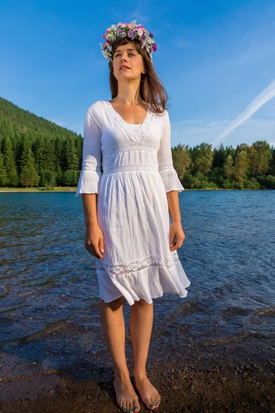 Mother Nature Standing in Water in Front of Mountain — Stock Photo, Image