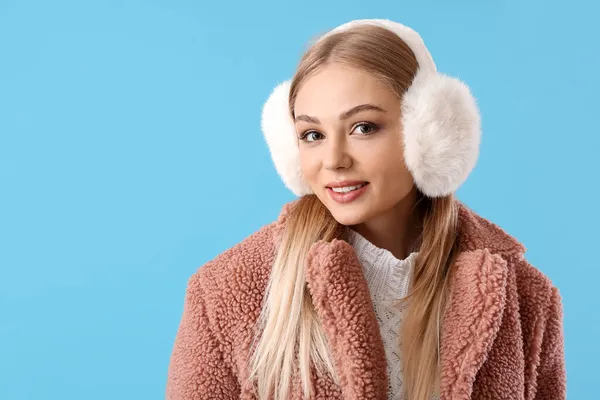 Beautiful Smiling Woman Fur Earmuffs Blue Background — Stock Photo, Image