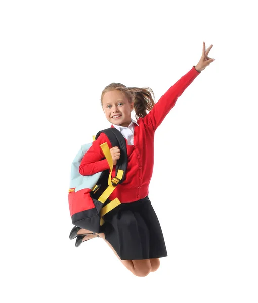 Beyaz Arka Planda Zıplayan Küçük Okul Kızı — Stok fotoğraf
