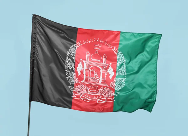 Bandeira Acenando Afeganistão Fundo Azul — Fotografia de Stock