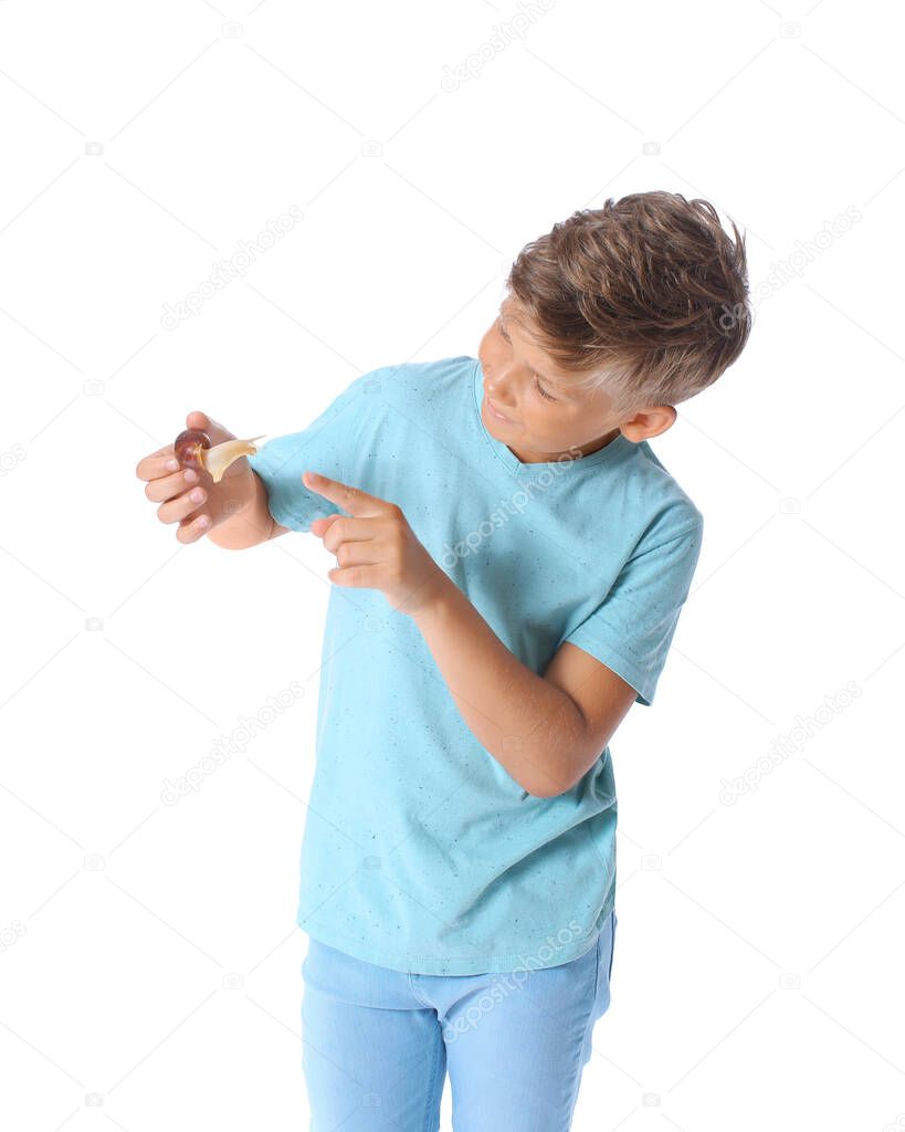 Little boy with achatina snail on white background