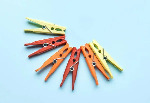 Different Clothespins Blue Background — Stock Photo, Image