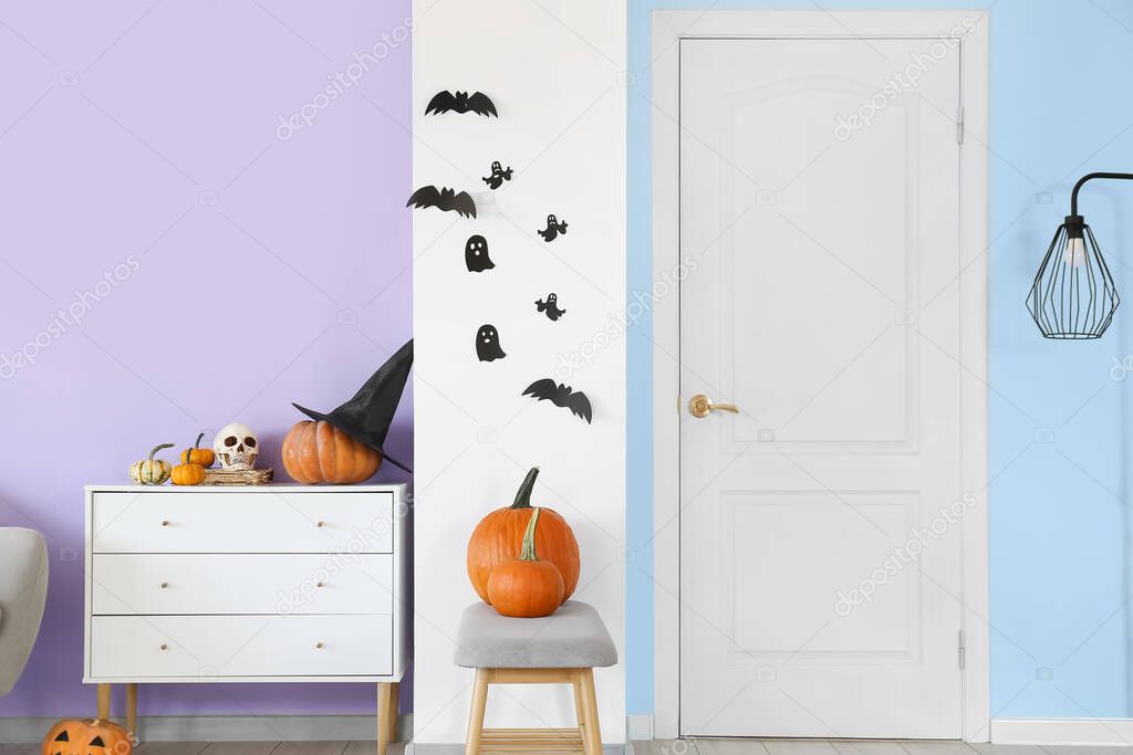Stylish interior of room decorated for Halloween celebration
