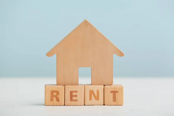 Wooden House Word Rent Table Blue Background — Stock Photo, Image