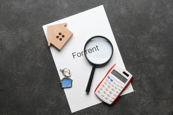 Paper Text Rent Magnifier Calculator Key Black Background — Stock Photo, Image
