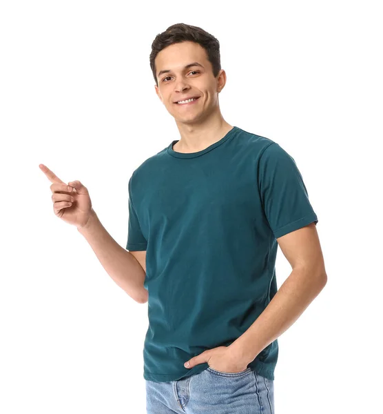 Schöner Junger Mann Stylischem Shirt Zeigt Auf Etwas Auf Weißem — Stockfoto