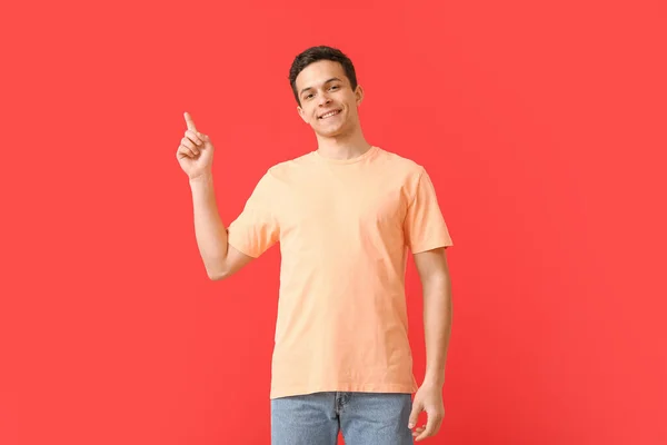 Handsome Young Man Stylish Shirt Pointing Something Color Background — Stock Photo, Image