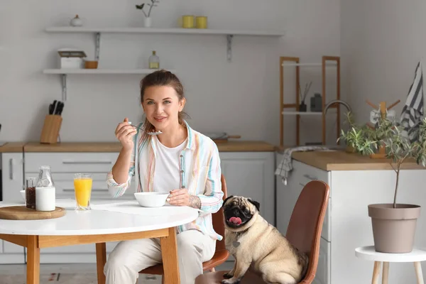 Young Woman Cute Pug Dog Having Breakfast Kitchen — Stock Photo, Image