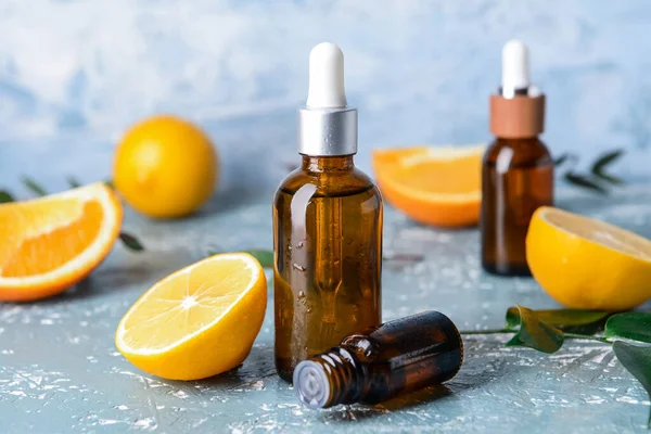 Bottles Citrus Essential Oils Color Background — Stock Photo, Image