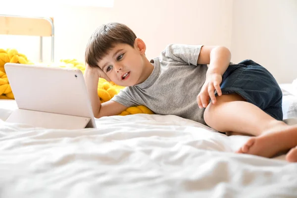 Little Boy Watching Cartoons Tablet Computer Bedroom — Stock Photo, Image