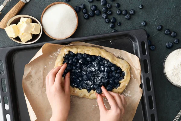 Woman Uncooked Blueberry Galette Dark Background — Stock Photo, Image