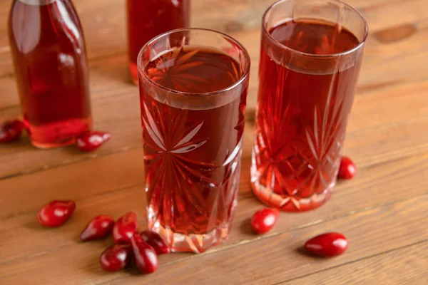 Glasses Healthy Dogwood Berry Drink Wooden Background — Stock Photo, Image