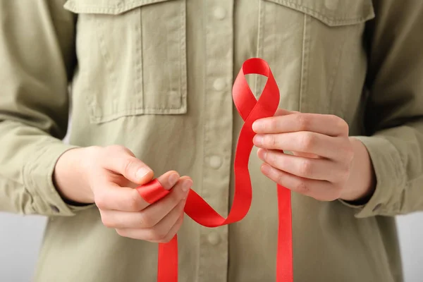Woman Holding Red Ribbon Aids Awareness Concept Closeup — Stock Photo, Image
