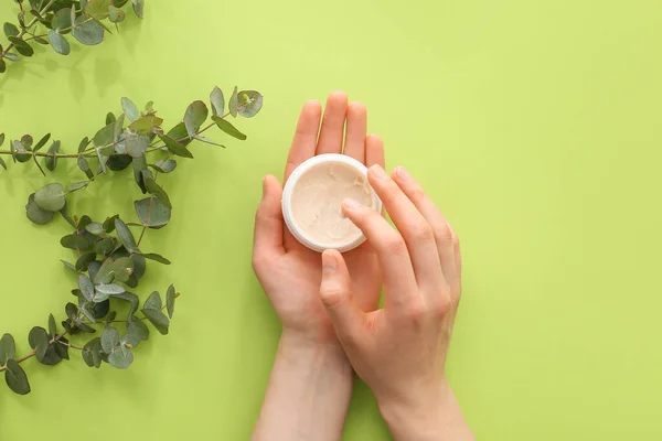 Woman Applying Hand Cream Color Background — Stock Photo, Image