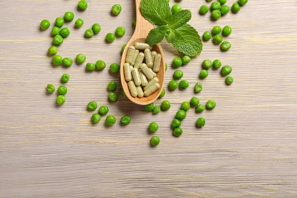 Spoon Pills Pea Mint Light Wooden Background — Stock Photo, Image