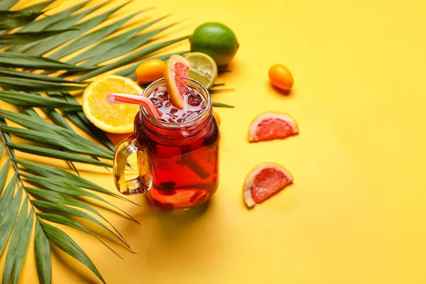 Mason Jar Tasty Cocktail Palm Leaves Citrus Fruits Color Background — Stock Photo, Image