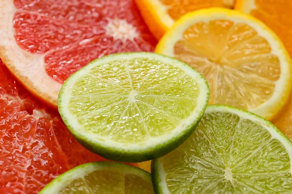 Slices Citrus Fruits Background Closeup — Stock Photo, Image