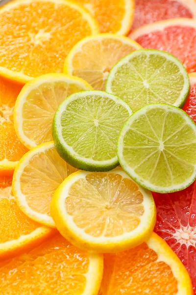 Slices Different Citrus Fruits Background Closeup — Stock Photo, Image