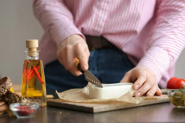 Woman Cutting Feta Cheese Table Kitchen — Stock Photo, Image