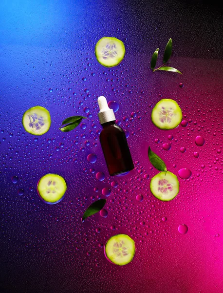 Bottle Cosmetic Product Cucumber Color Background Water Drops — Stock Photo, Image
