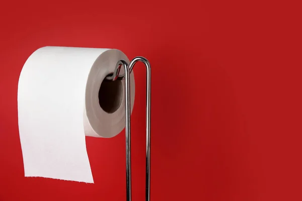 Holder Toilet Paper Roll Red Background Closeup — Stock Photo, Image