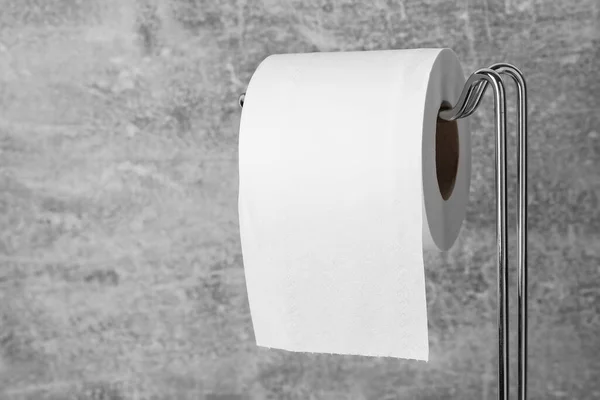 Holder Soft Toilet Paper Roll Grunge Background Closeup — Stock Photo, Image