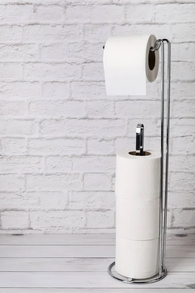 Modern Holder Soft Toilet Paper Rolls Wooden Floor White Brick — Stock Photo, Image