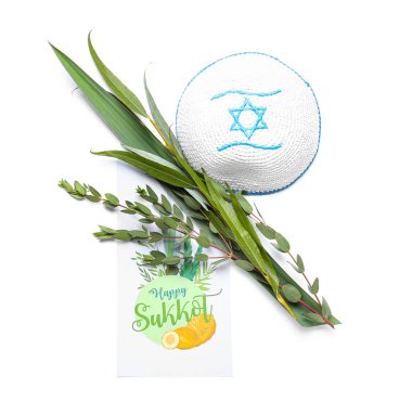 Beyaz arkaplanda Sukkot festival simgeleri ve tebrik kartı