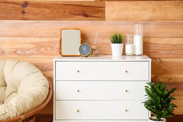 Golden Alarm Clock Stylish Chest Drawers Decor Wooden Wall — Stock Photo, Image