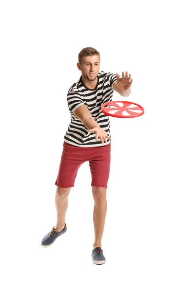 Jovem Captura Frisbee Fundo Branco — Fotografia de Stock