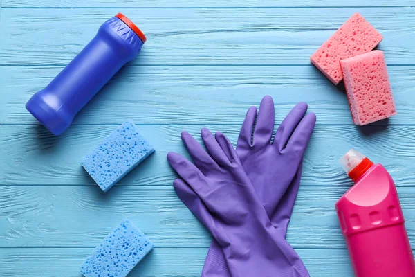 Cleaning Sponges Gloves Bottles Detergent Color Wooden Background — Stock Photo, Image