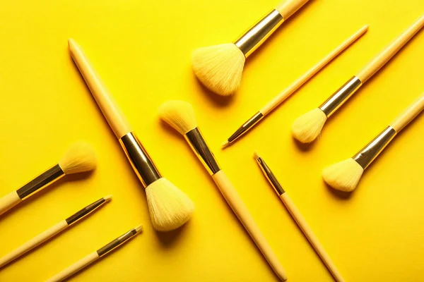 Different Stylish Makeup Brushes Yellow Background — Stock Photo, Image