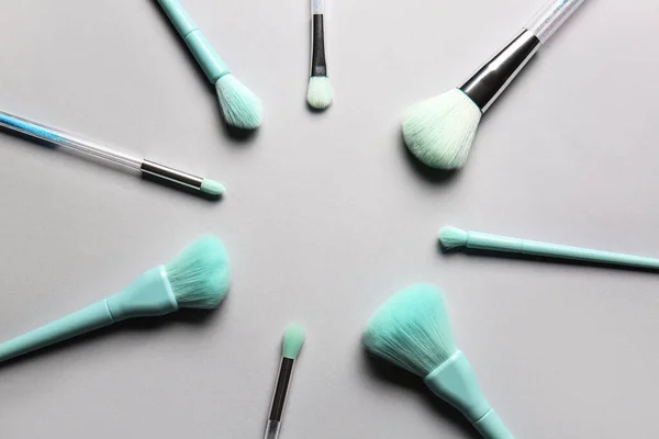 Frame Made Stylish Makeup Brushes Grey Background — Stock Photo, Image