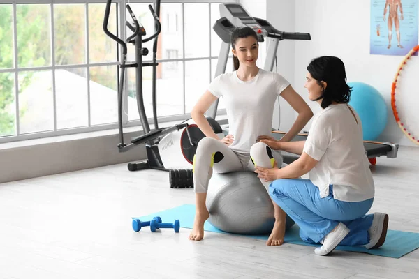 Mature Physiotherapist Working Young Woman Fitball Rehabilitation Center — Stock Photo, Image