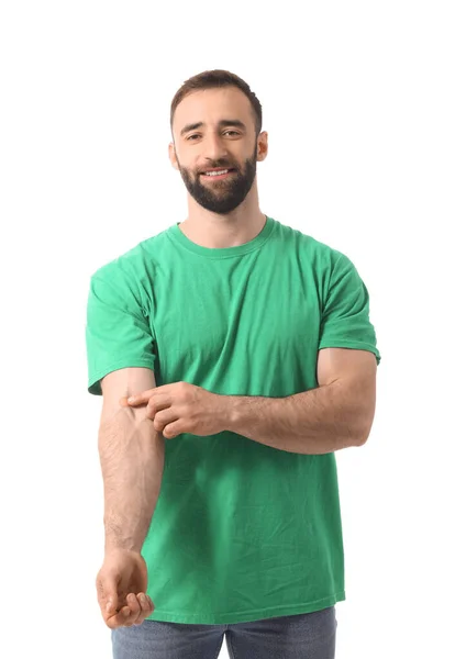 Handsome Man Applying Adhesive Patch His Arm White Background — Stock Photo, Image