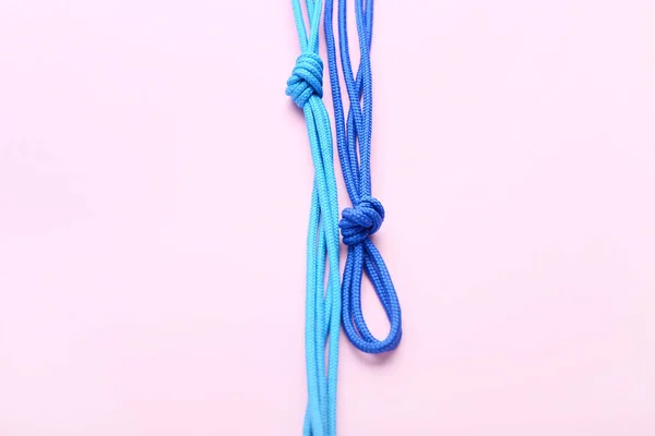 Blue Shoe Laces Tied Knots Pink Background Closeup — Stock Photo, Image