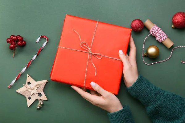 Female Hands Christmas Gift Decorations Color Background Closeup — Stock Photo, Image