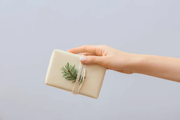 Female Hand Gift Box Grey Background Closeup — Stock Photo, Image