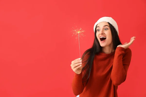 Mujer Emocionada Con Bengala Navidad Sobre Fondo Rojo —  Fotos de Stock