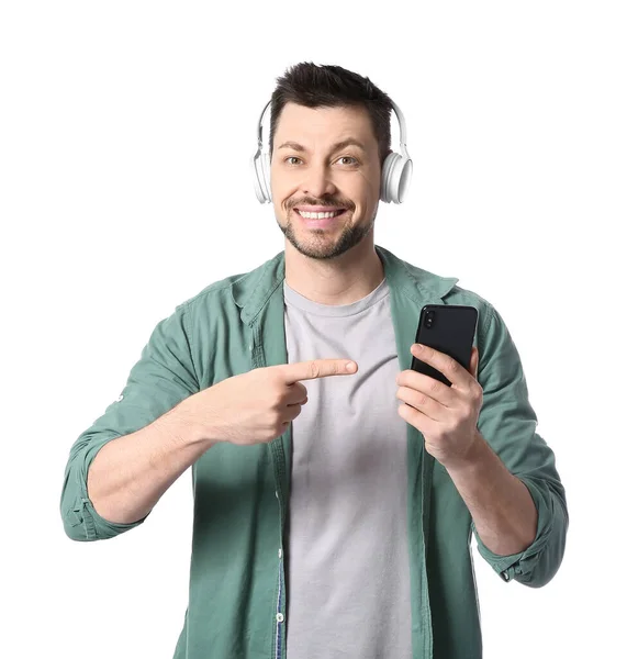 Homme Avec Téléphone Écouteurs Sur Fond Blanc — Photo
