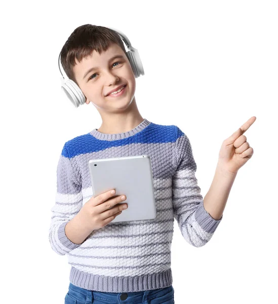 Little Boy Tablet Computer Headphones Pointing Something White Background — Stock Photo, Image