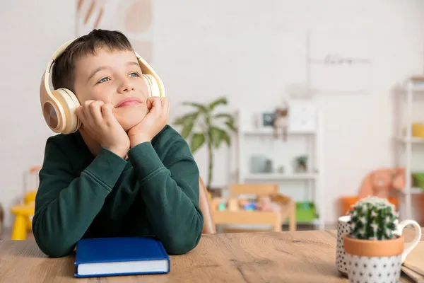 Little Boy Listening Audiobook Home — Stock Photo, Image