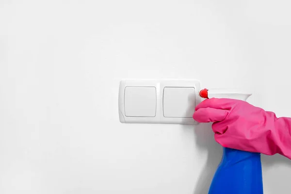 Woman Spraying Switch White Wall Closeup — Stock Photo, Image