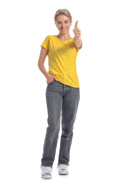Mladá Žena Žlutém Tričku Ukazující Palec Nahoru Bílém Pozadí — Stock fotografie