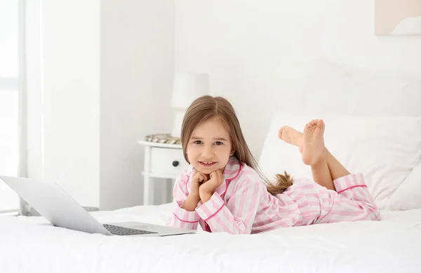 Cute Little Girl Watching Cartoons Laptop Bedroom — Stock Photo, Image