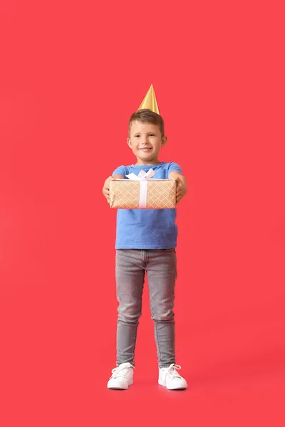 Cute Little Boy Party Hat Gift Box Red Background — Stock Photo, Image