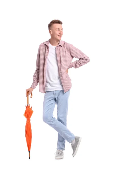 Junger Mann Mit Orangefarbenem Regenschirm Auf Weißem Hintergrund — Stockfoto