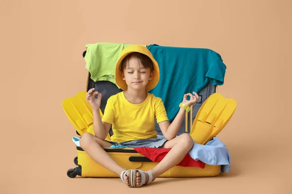 Little Boy Suitcase Belongings Meditating Color Background — Stock Photo, Image